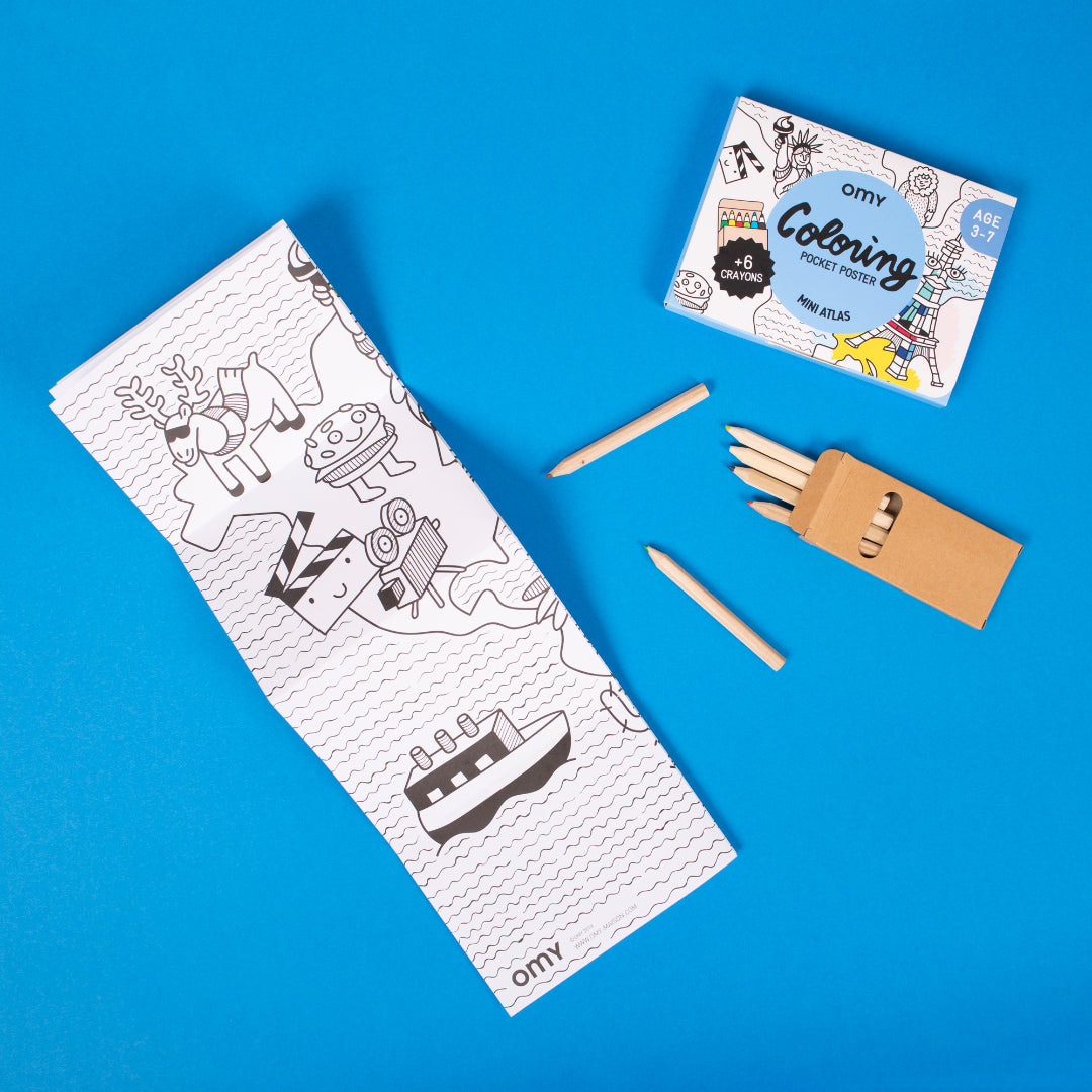 Coloring book with illustrations, coloring pencils, and a small box on a blue background
