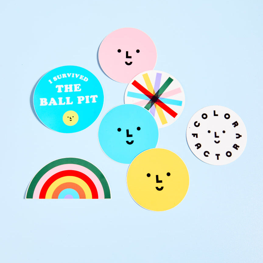 Colorful assortment of stickers on a blue background