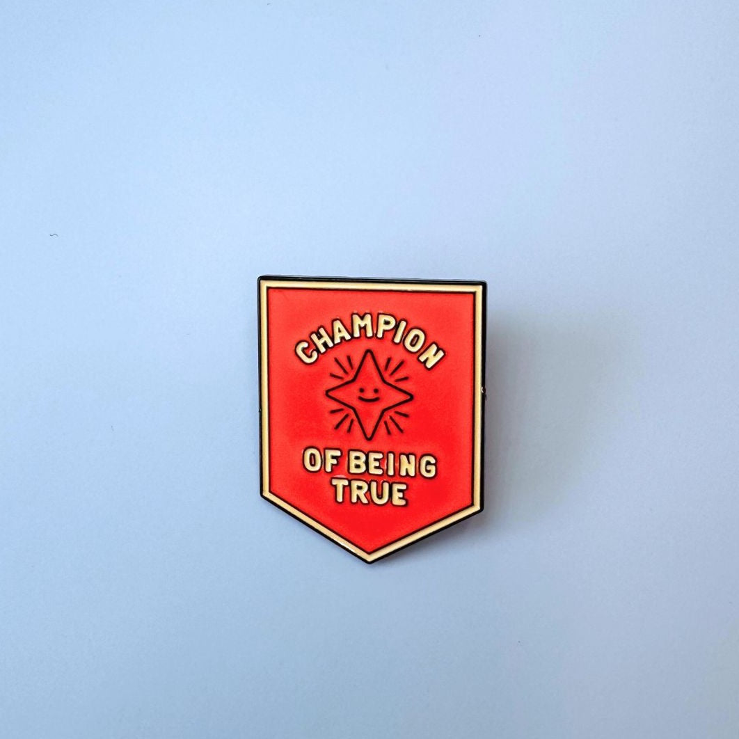 Champion of Being True Enamel Pin