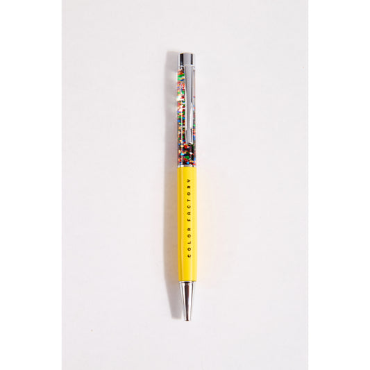 Yellow confetti pen with 'Color Factory' branding on a white background