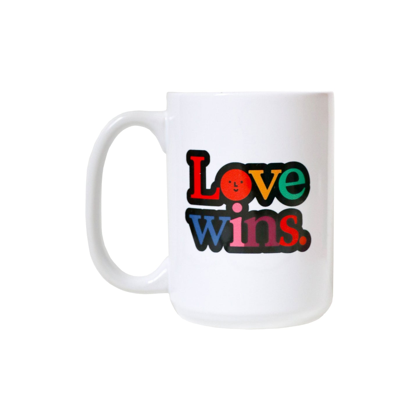 Large white mug with rainbow letters that spell "Love Wins". Designed by the Color Factory team for Pride.