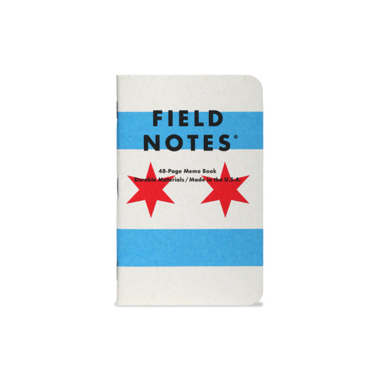 Field Notes notebook with red star design on a white background