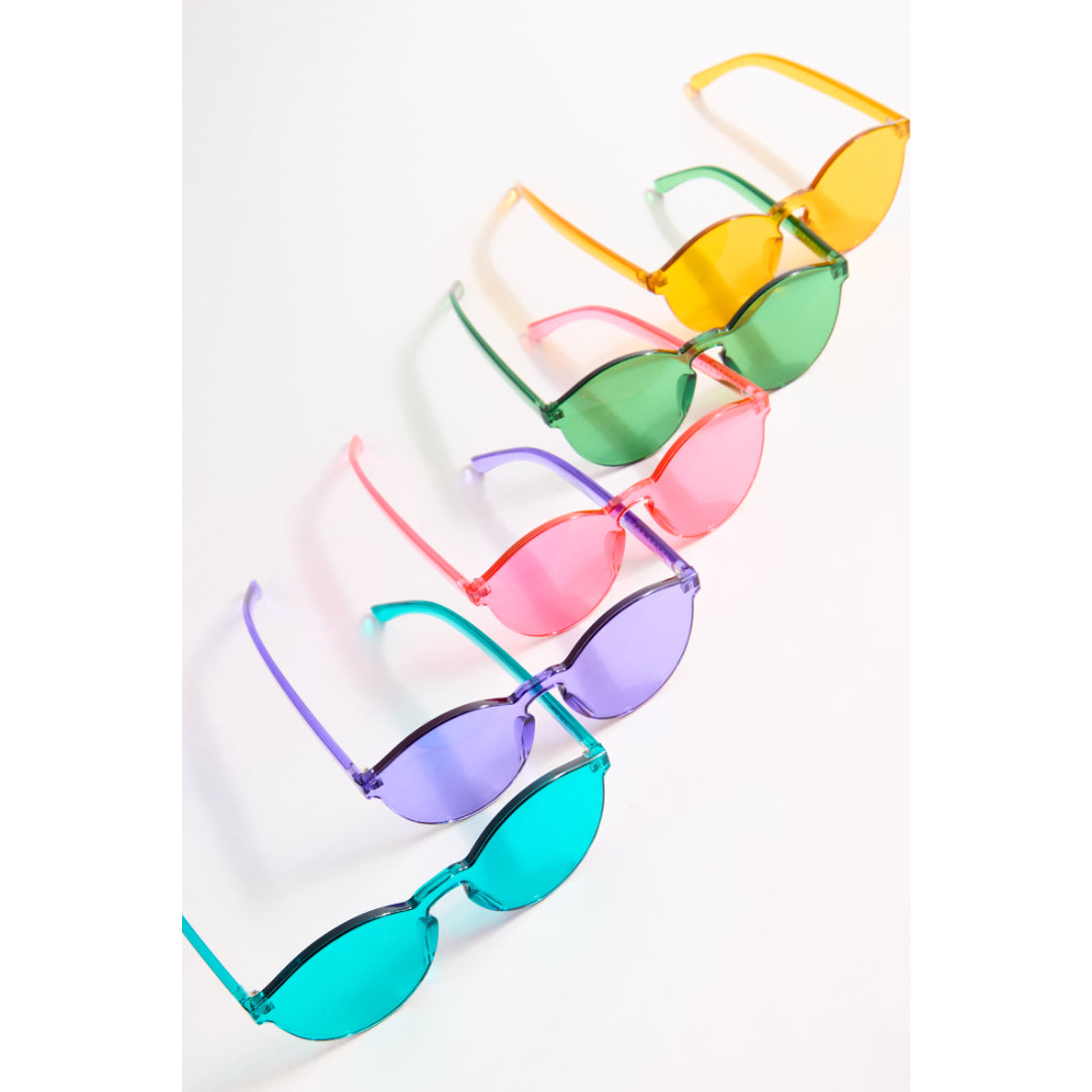 Set of colorful sunglasses with multicolored frames on a white background
