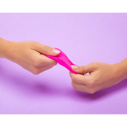Two hands stretching a pink 'do' against a purple background