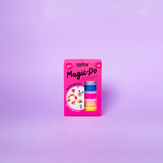 Packaging of omy Magic-Do product on a purple background