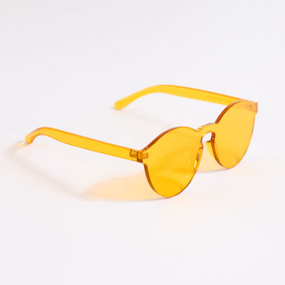 Orange sunglasses on a white background