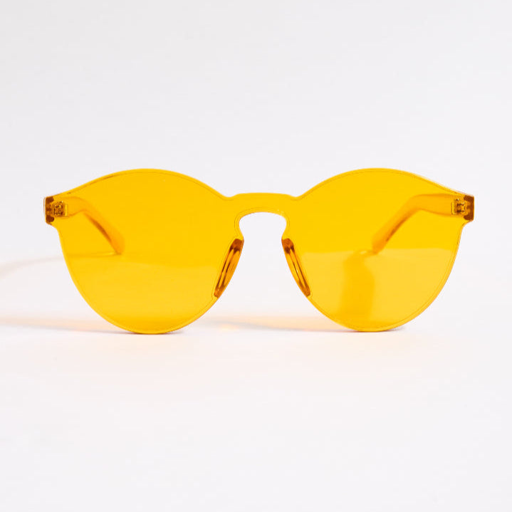 Orange sunglasses on a white background