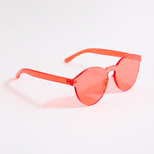Red sunglasses on a white background
