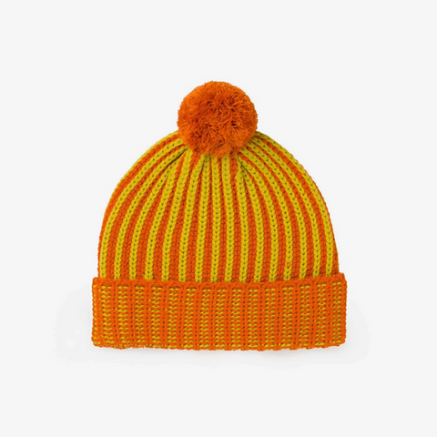 Chunky knit beanie with yellow and orange contrasting stripes and fluffy pom pom on top. 